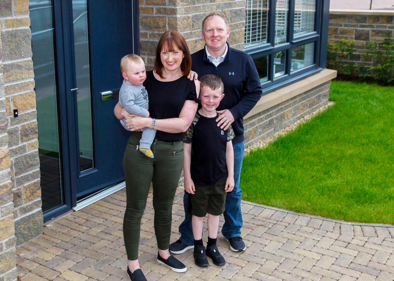 Jason and Lorna Sandie in front garden